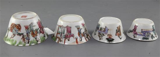 A set of nine Chinese famille rose nesting cups, Daoguang period, graduating from 4.1cm to 11cm, largest cup with rim chip and short ha